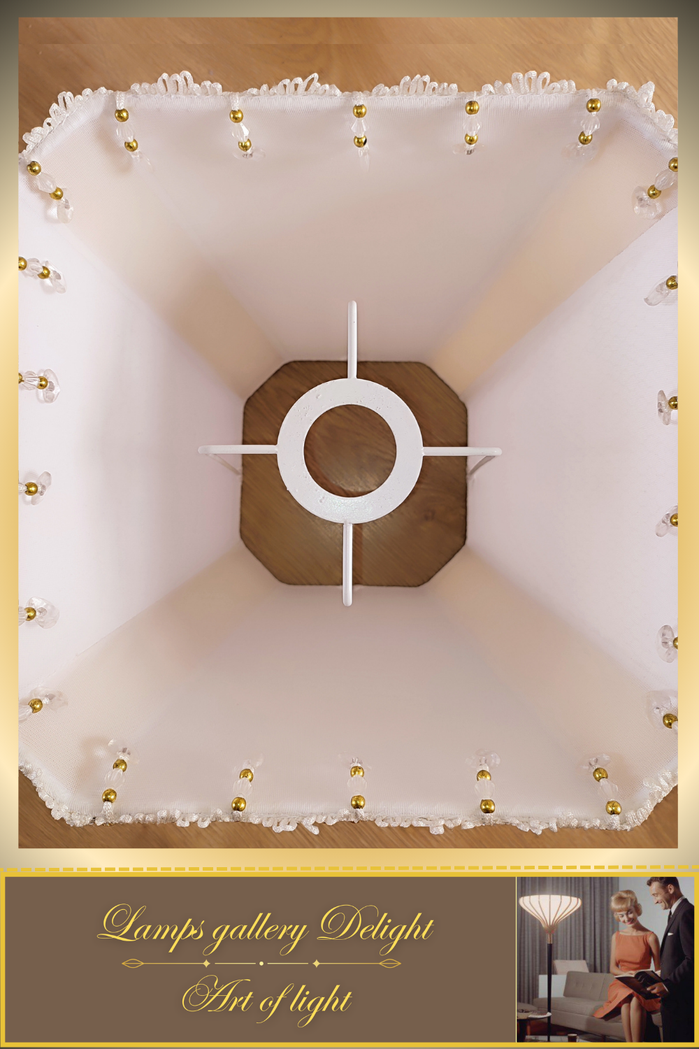 A table lamp with a golden-white fabric shade for subdued light in the bedroom. 6401
