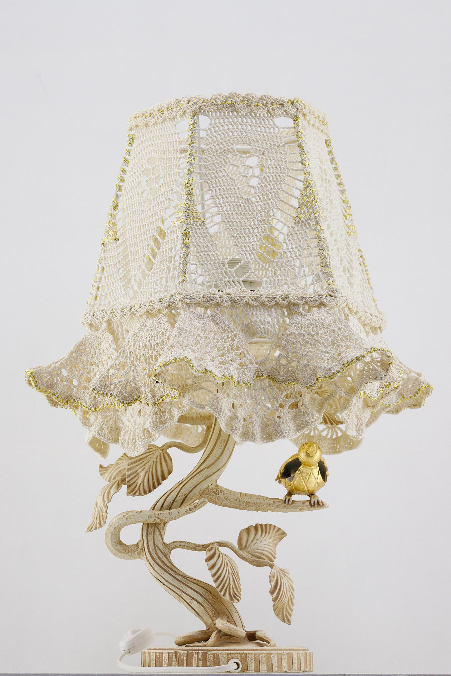 Victorian crochet table lamp with artistic wrought iron base