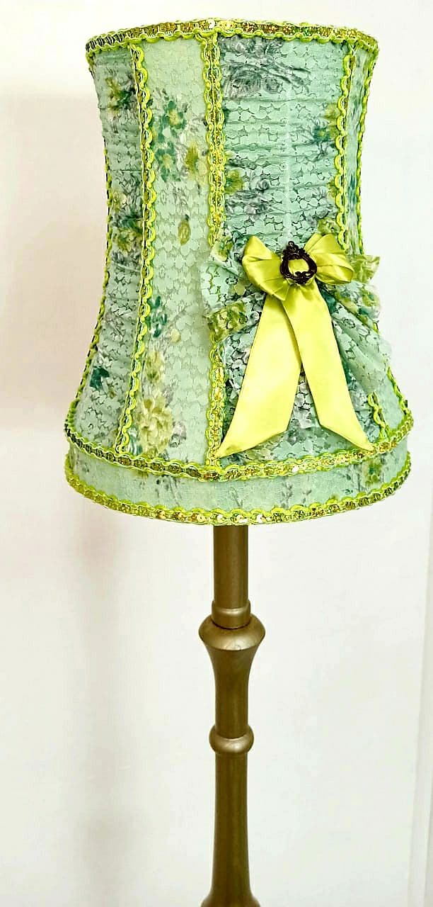 A unique lampshade. A fabulous light green lampshade with guipure and textiles for a table lamp. 0401