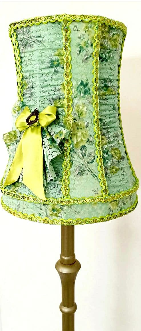 A unique lampshade. A fabulous light green lampshade with guipure and textiles for a table lamp. 0401