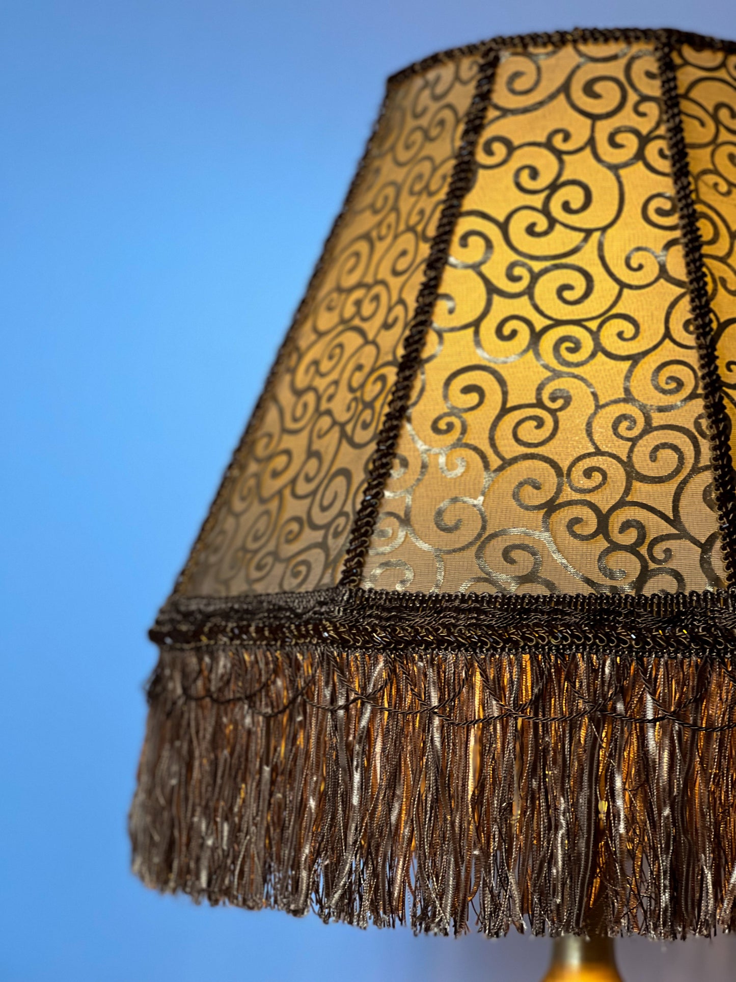 Lampshade. Luxurious Victorian fringed lampshade in brown and golden color