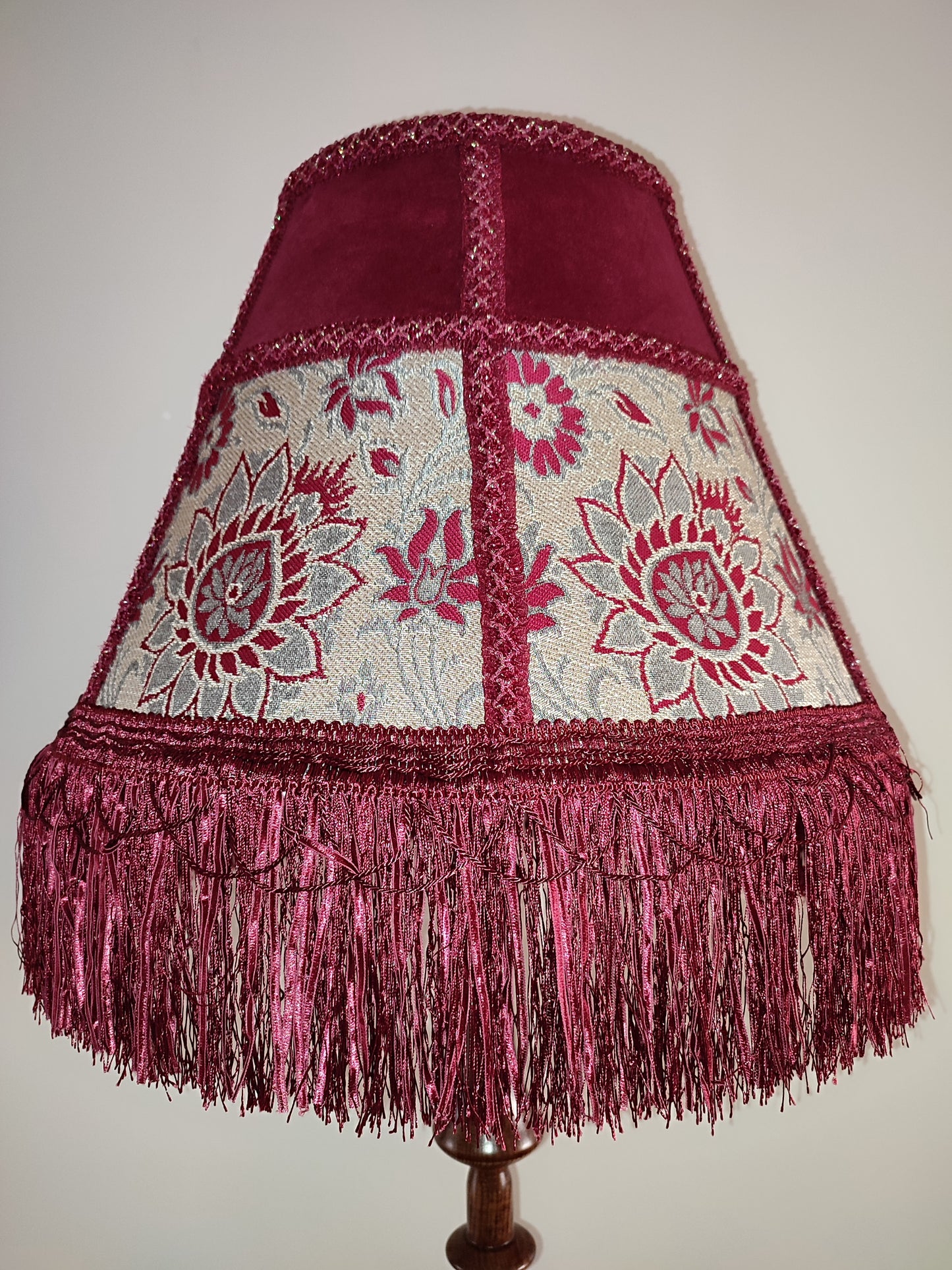 Floor lamp, Elegant Vintage-Inspired Floor Lamp with Rich Ruby Shade, Delicate Floral Embroidery & Luxurious Fringe Details on a Sculpted Wooden Base. 3104