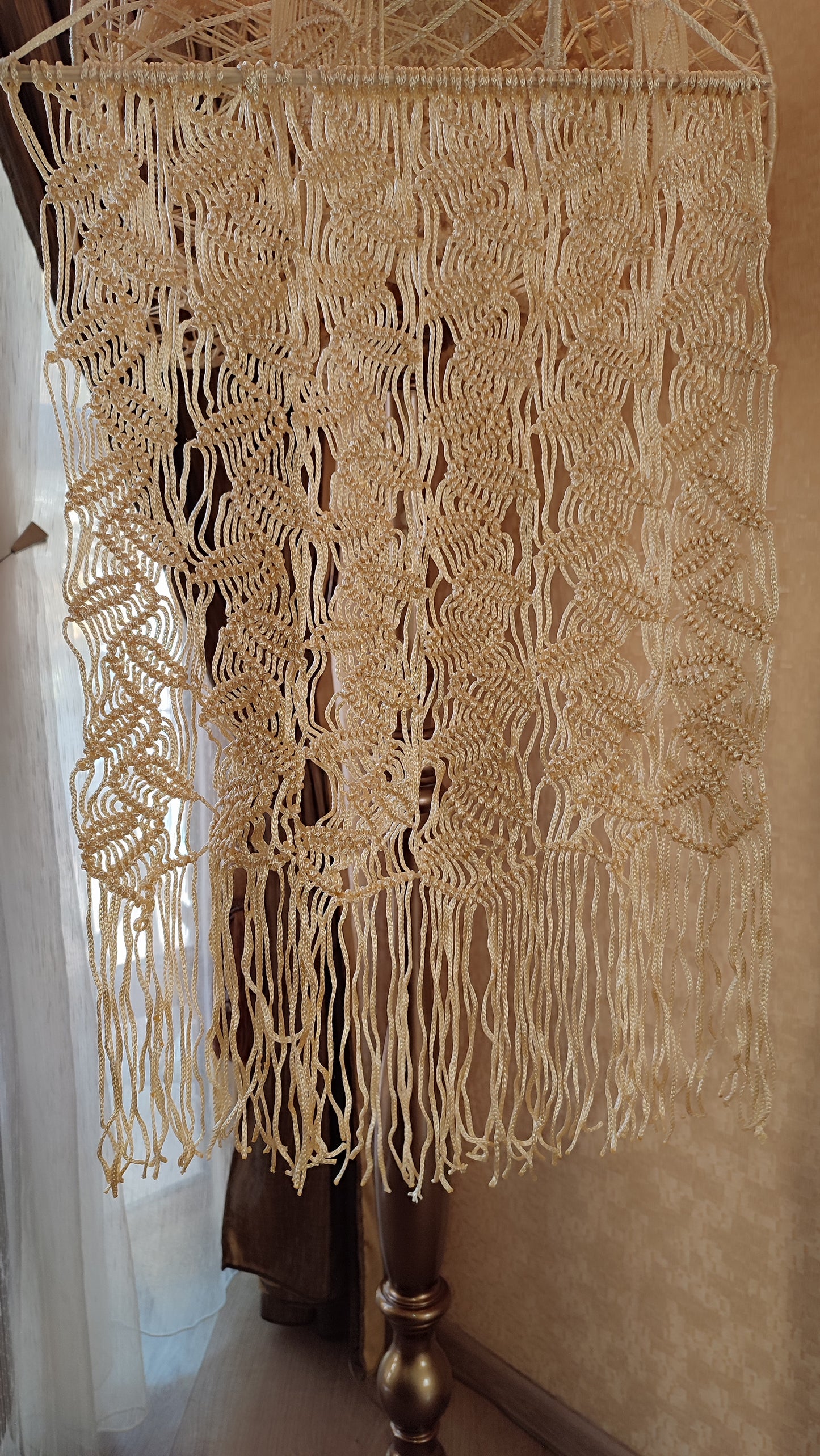 A unique macrame lampshade with a complex panel design. 2207