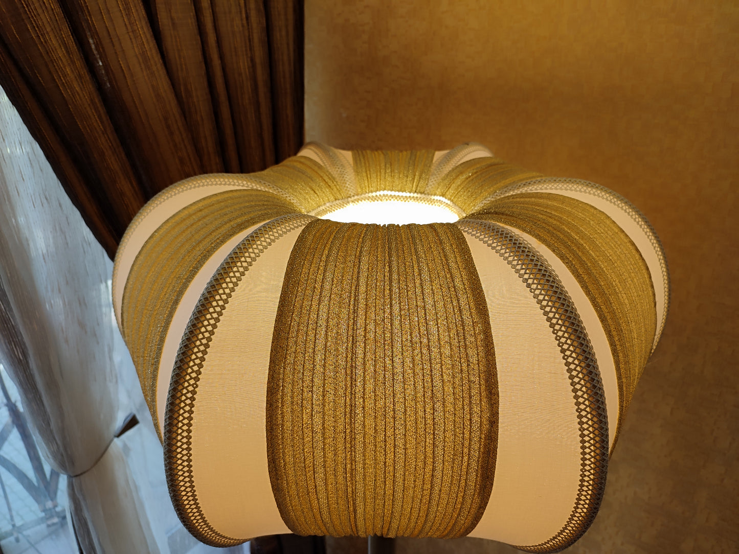 A two-tone creamy golden lampshade, delicate crystal beads and an elegant wooden base add a touch of luxurious radiance 2206