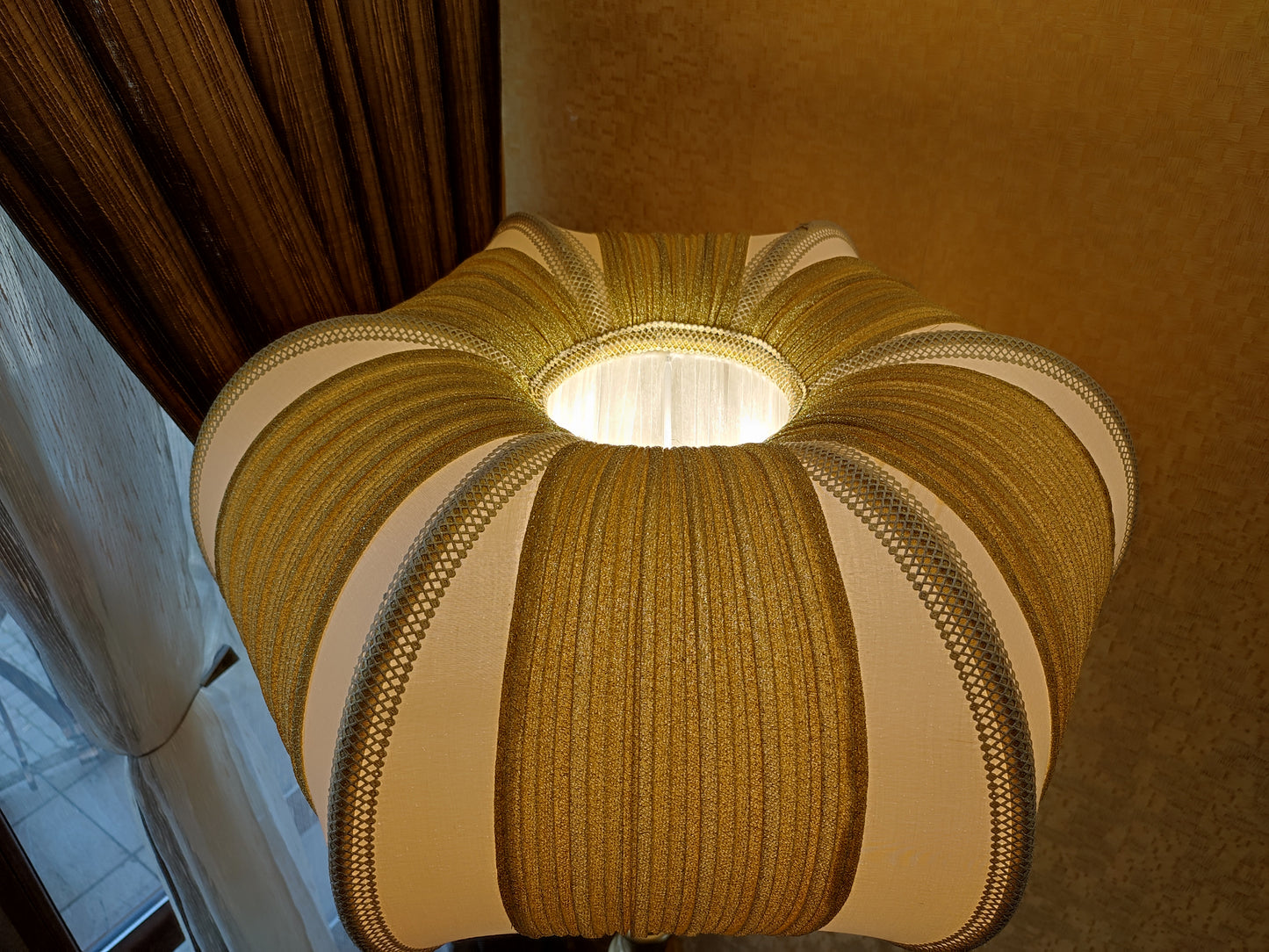 A two-tone creamy golden lampshade, delicate crystal beads and an elegant wooden base add a touch of luxurious radiance 2206