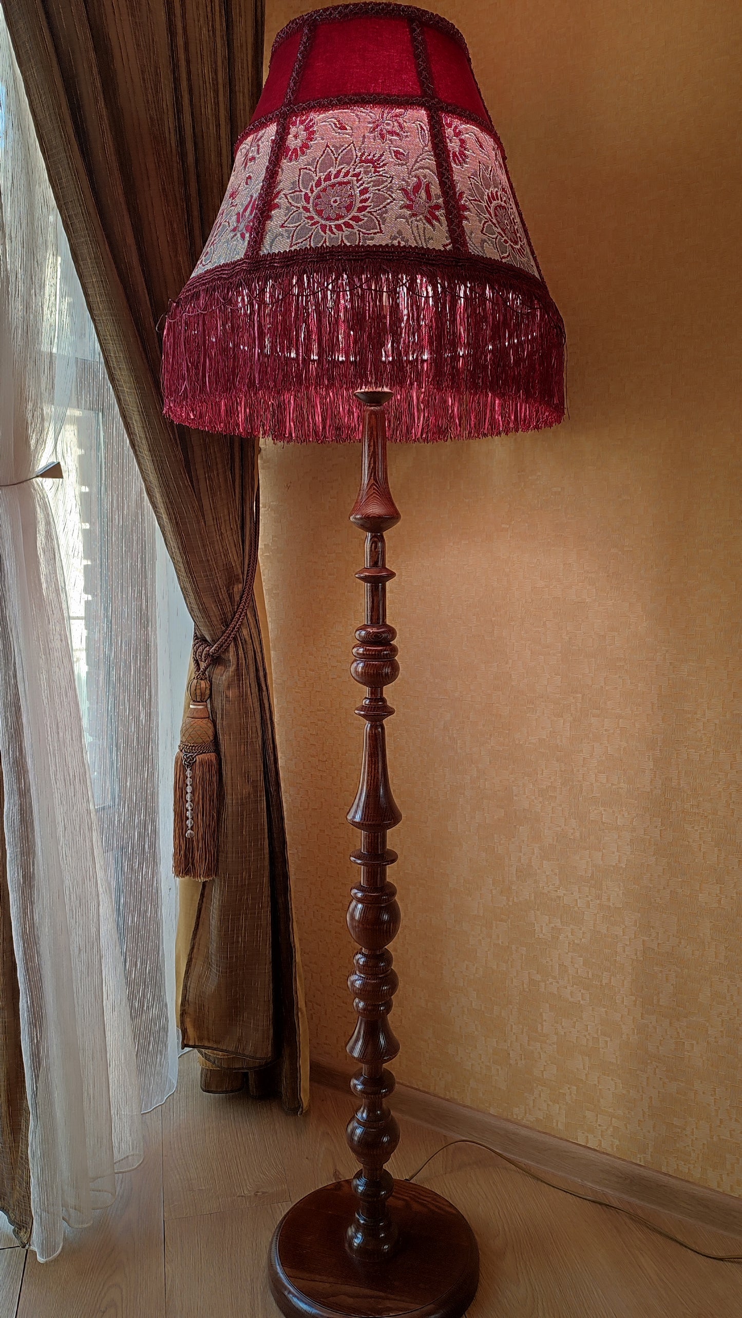 Floor lamp, Elegant Vintage-Inspired Floor Lamp with Rich Ruby Shade, Delicate Floral Embroidery & Luxurious Fringe Details on a Sculpted Wooden Base. 3104
