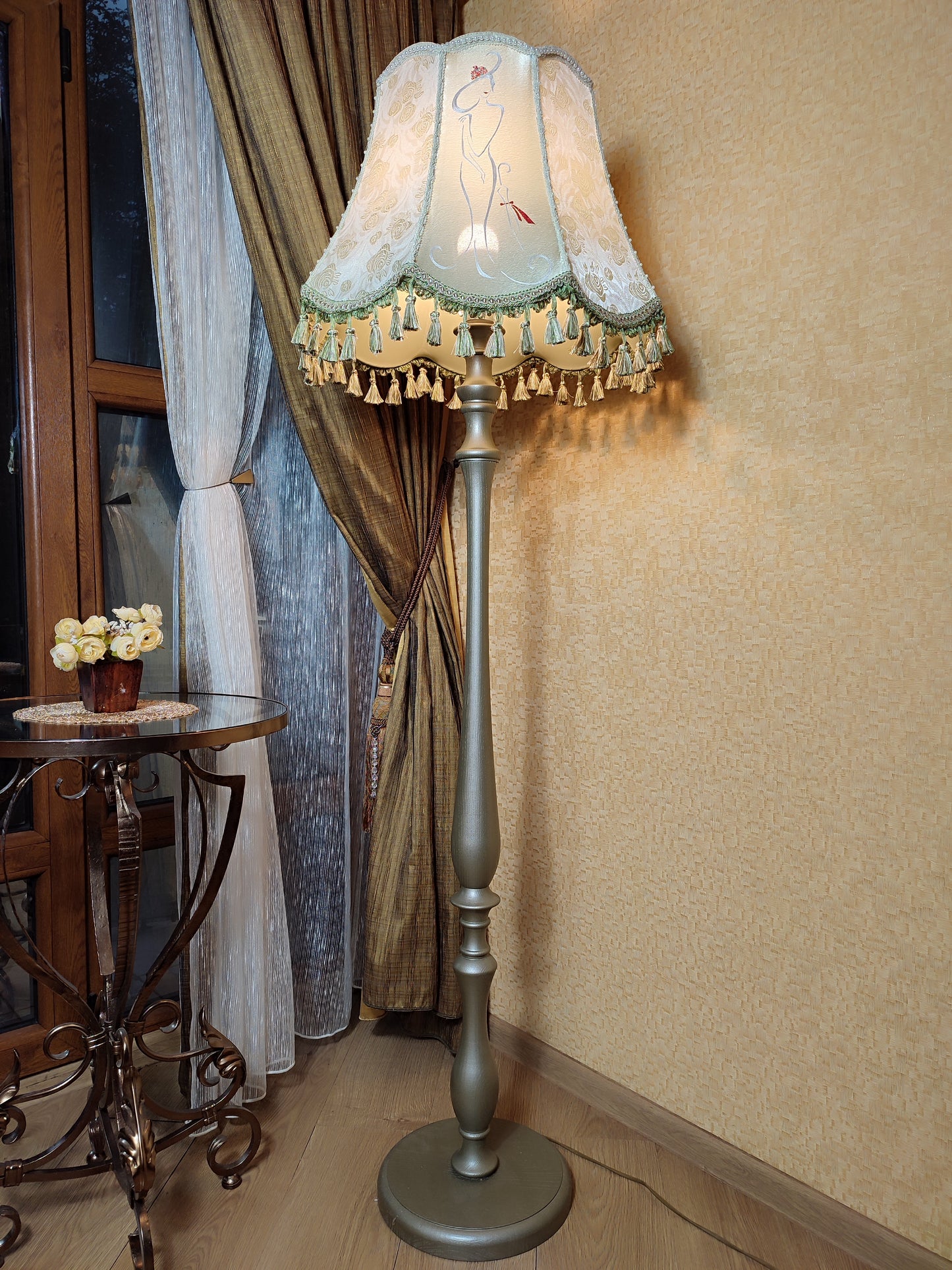 A Victorian floor lamp with a fabric shade and an exquisite floral umbrella motif with tassels. 3705