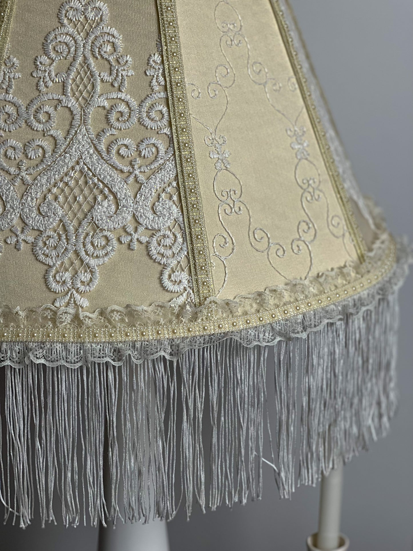 Victorian lampshade. Cream patterned lampshade with long fringe. 1106