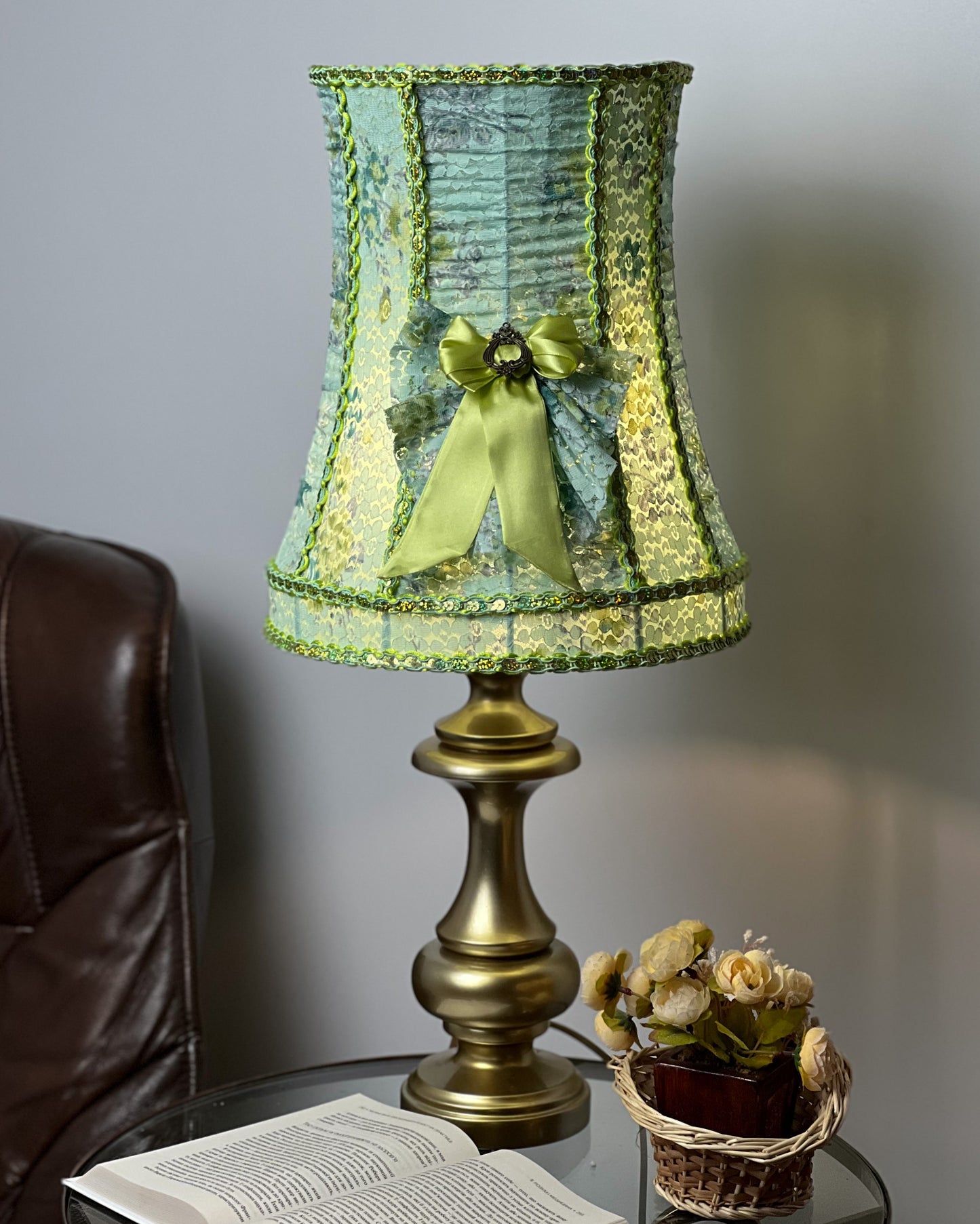 A unique lampshade. A fabulous light green lampshade with guipure and textiles for a table lamp. 0401