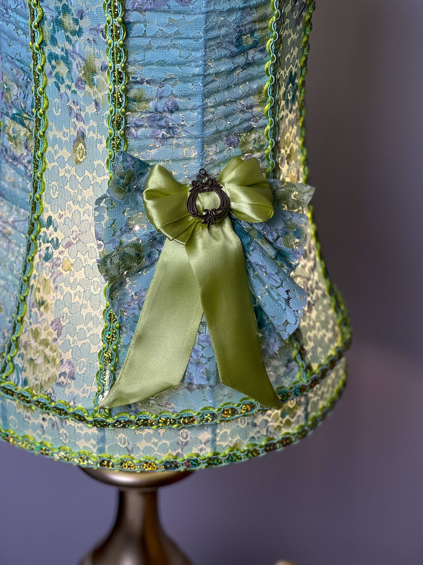 A unique lampshade. A fabulous light green lampshade with guipure and textiles for a table lamp. 0401