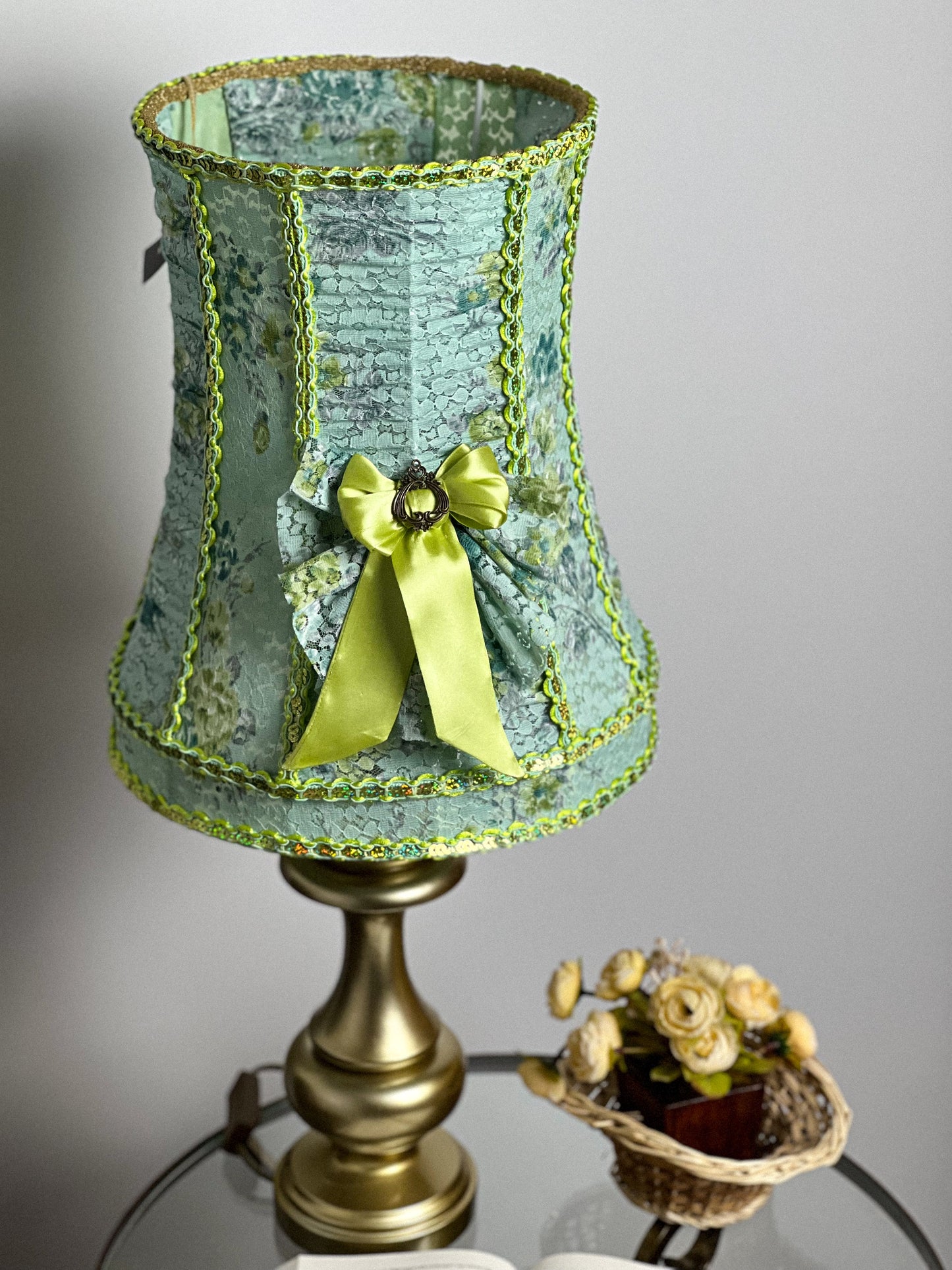 A unique lampshade. A fabulous light green lampshade with guipure and textiles for a table lamp. 0401