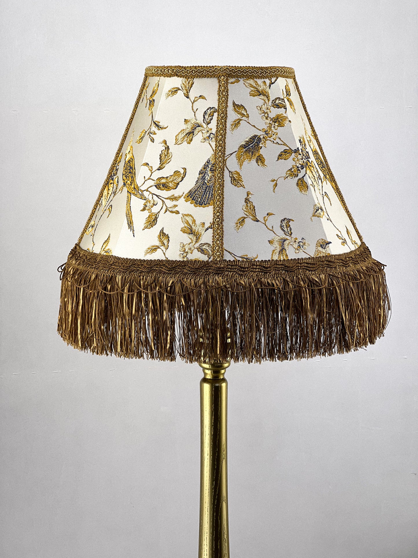 Lampshade. Victorian coffee-colored fabric lampshade with birds.