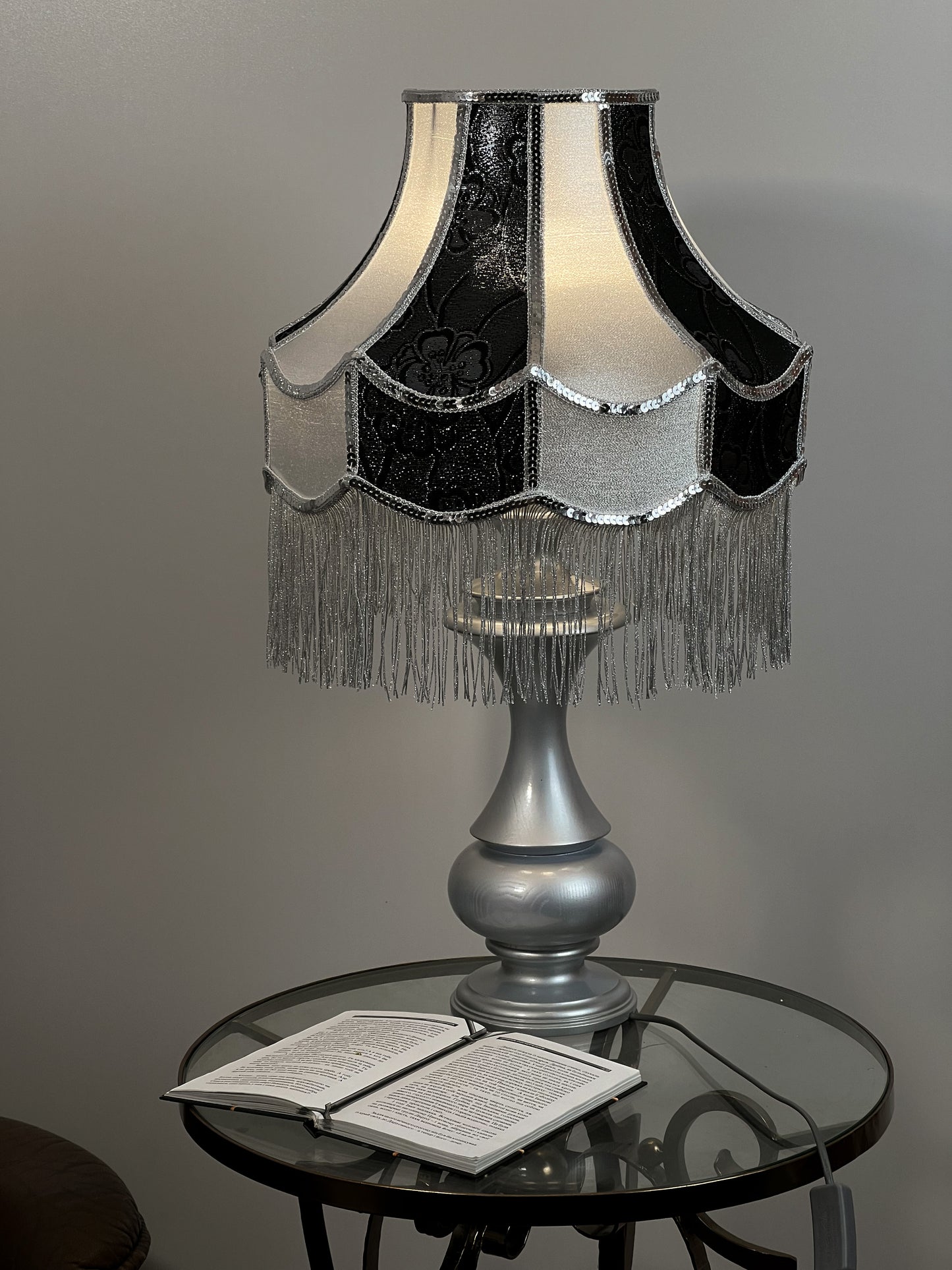 Luxurious Victorian table lamp with sequins and fringe.