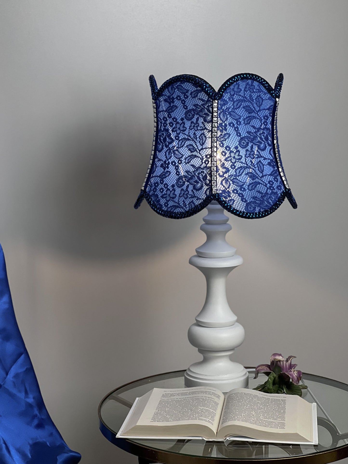 Table lamp. Blue table lamp with a handmade shade.