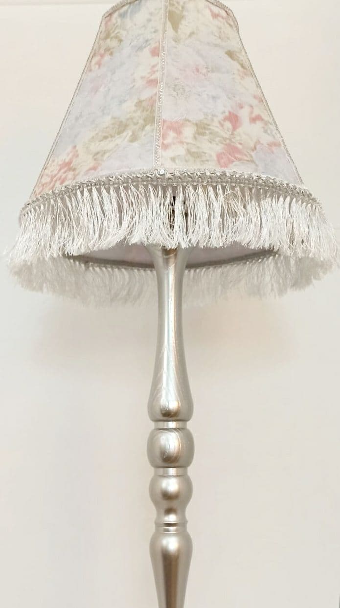 Floral lampshade with embossed patterned fabric and fringe. 0203