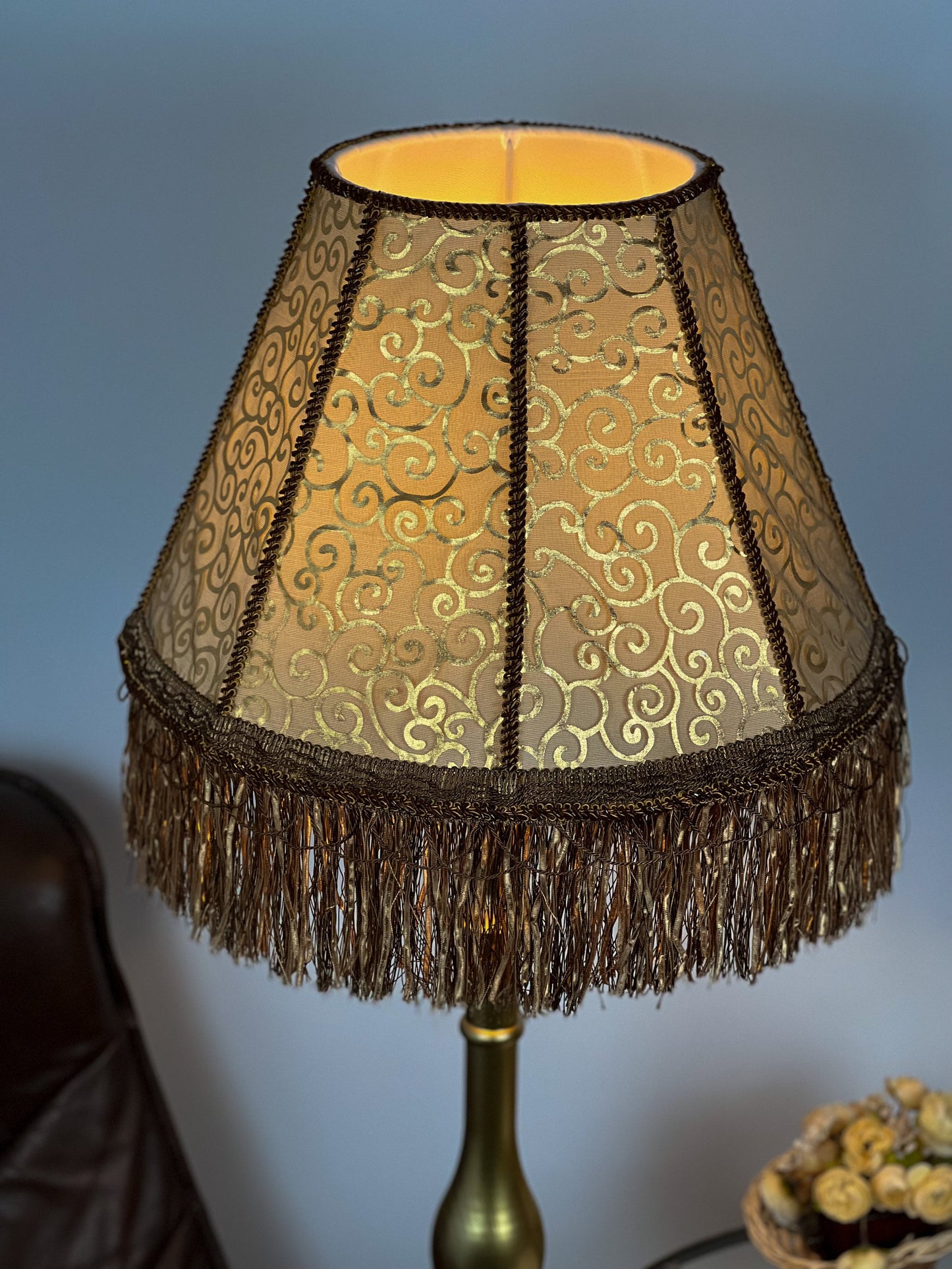 Lampshade. Luxurious Victorian fringed lampshade in brown and golden color