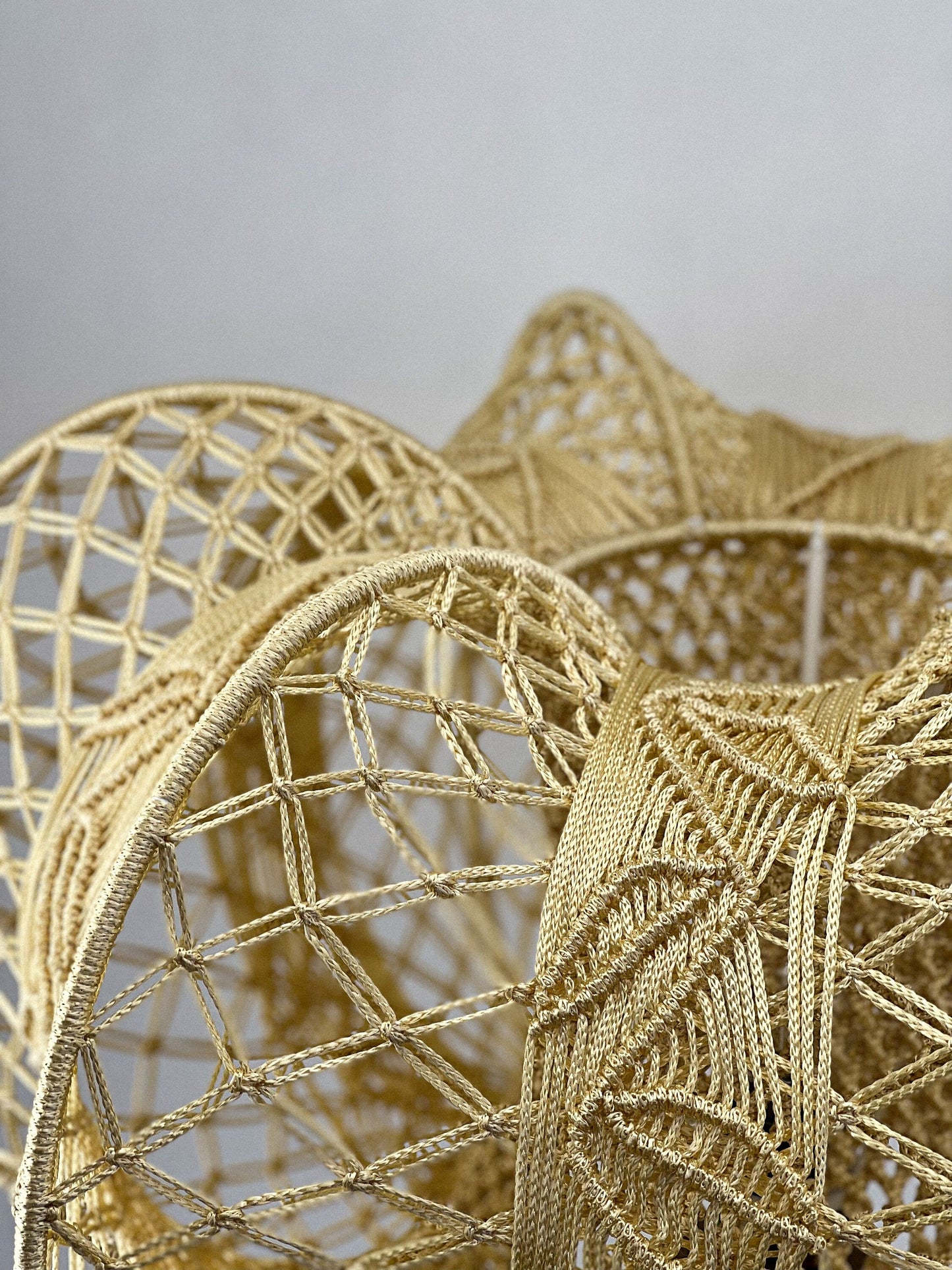 A unique macrame lampshade with a complex panel design. 2207