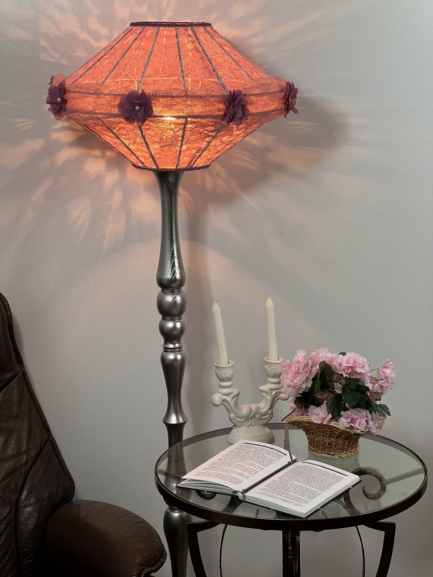 Victorian pink lampshade with floral design.
