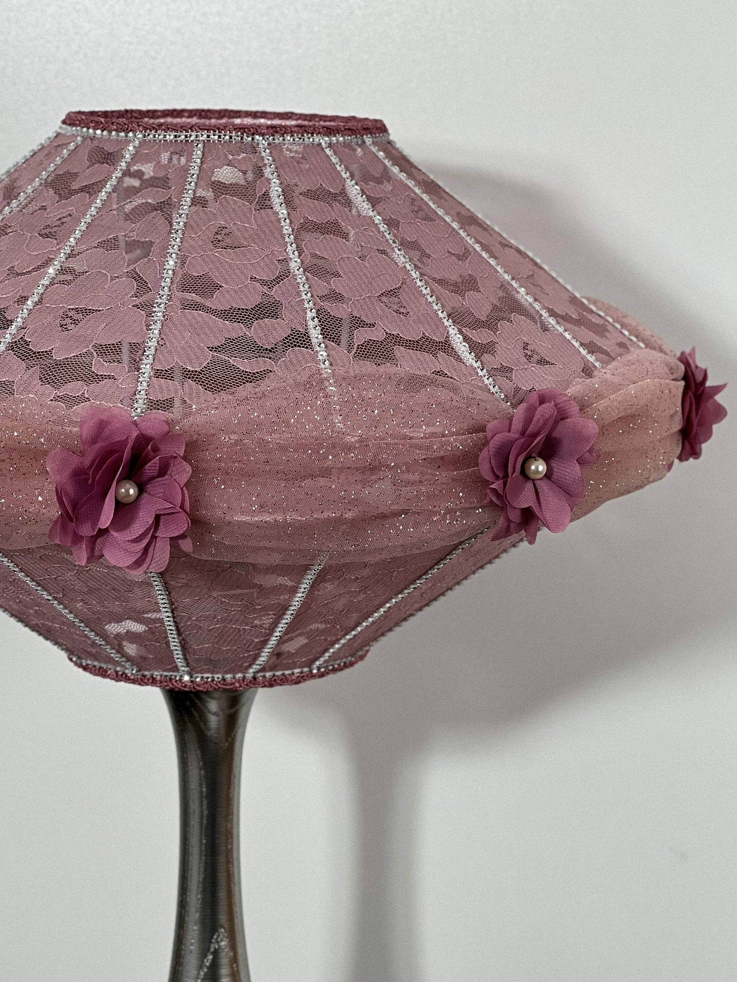 Victorian pink lampshade with floral design.