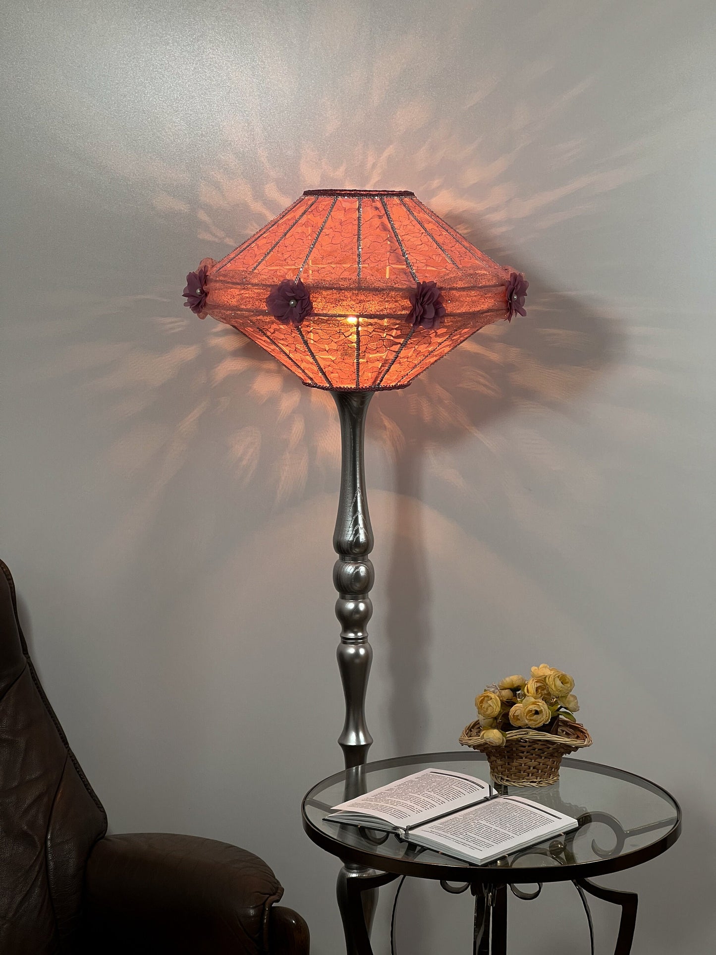 Victorian pink lampshade with floral design.
