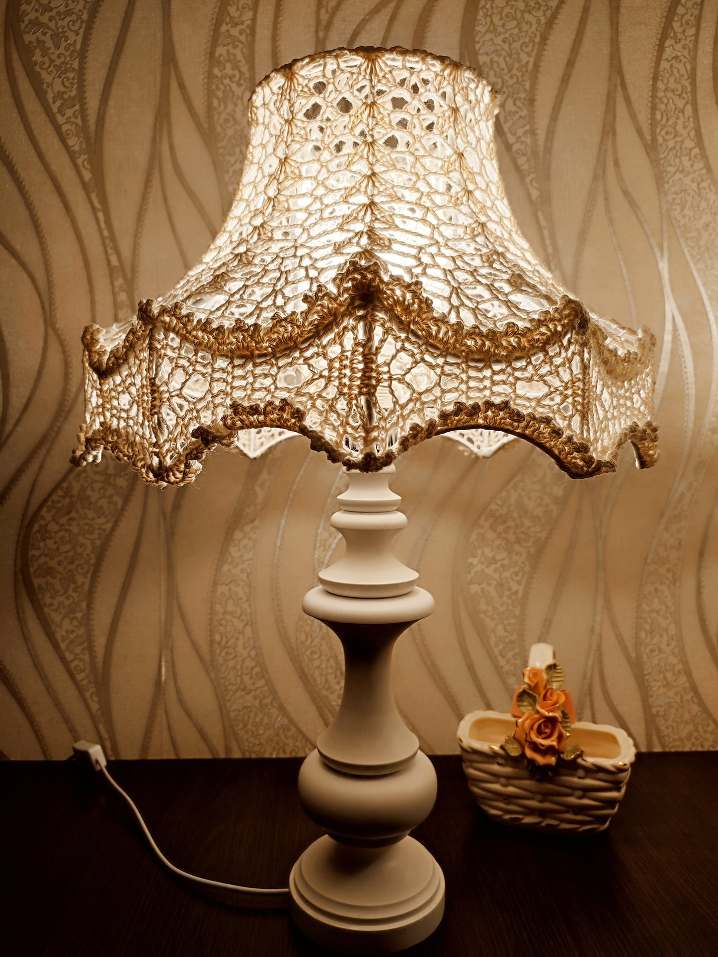 Table lamp, bedside. A chic table lamp in pastel white color with a delicate lace shade. 1301