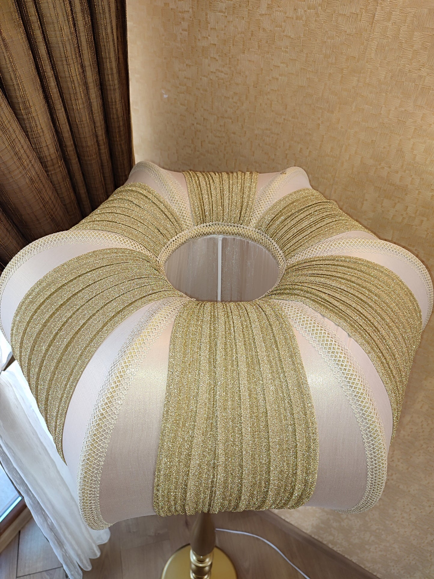 A two-tone creamy golden lampshade, delicate crystal beads and an elegant wooden base add a touch of luxurious radiance 2206