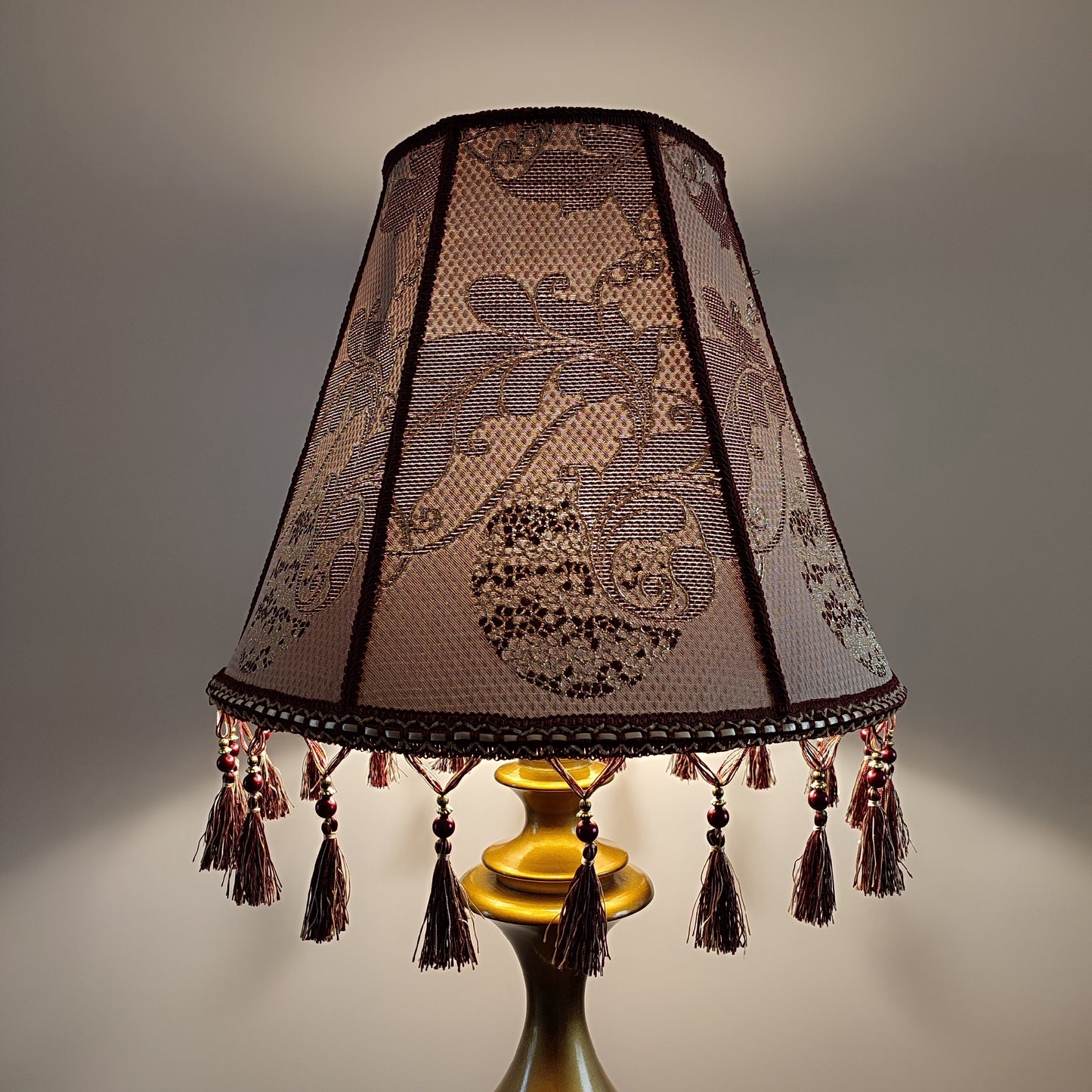 Retro burgundy lampshade with an elegant tassel and beaded details. 4503