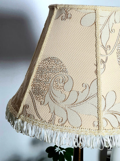 Victorian-style floor lamp with a patterned fabric shade. 3808