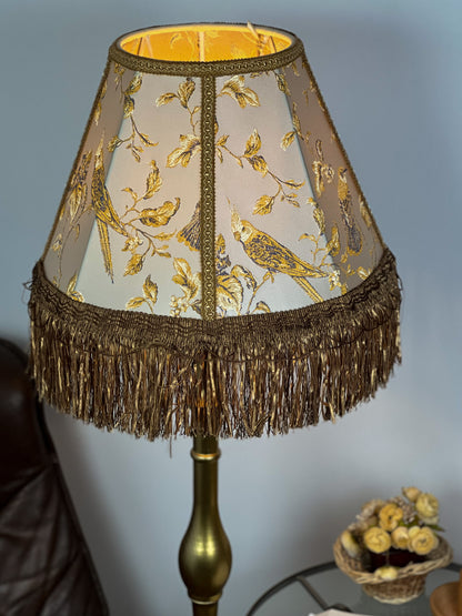Lampshade. Victorian coffee-colored fabric lampshade with birds.