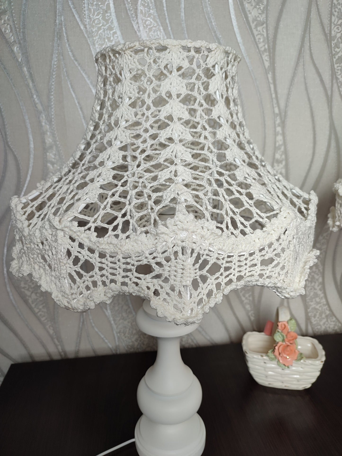 Table lamp, bedside. A chic table lamp in pastel white color with a delicate lace shade. 1301