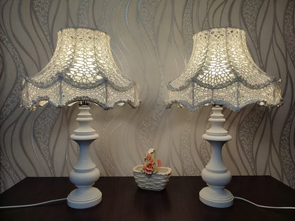 Table lamp, bedside. A chic table lamp in pastel white color with a delicate lace shade. 1301