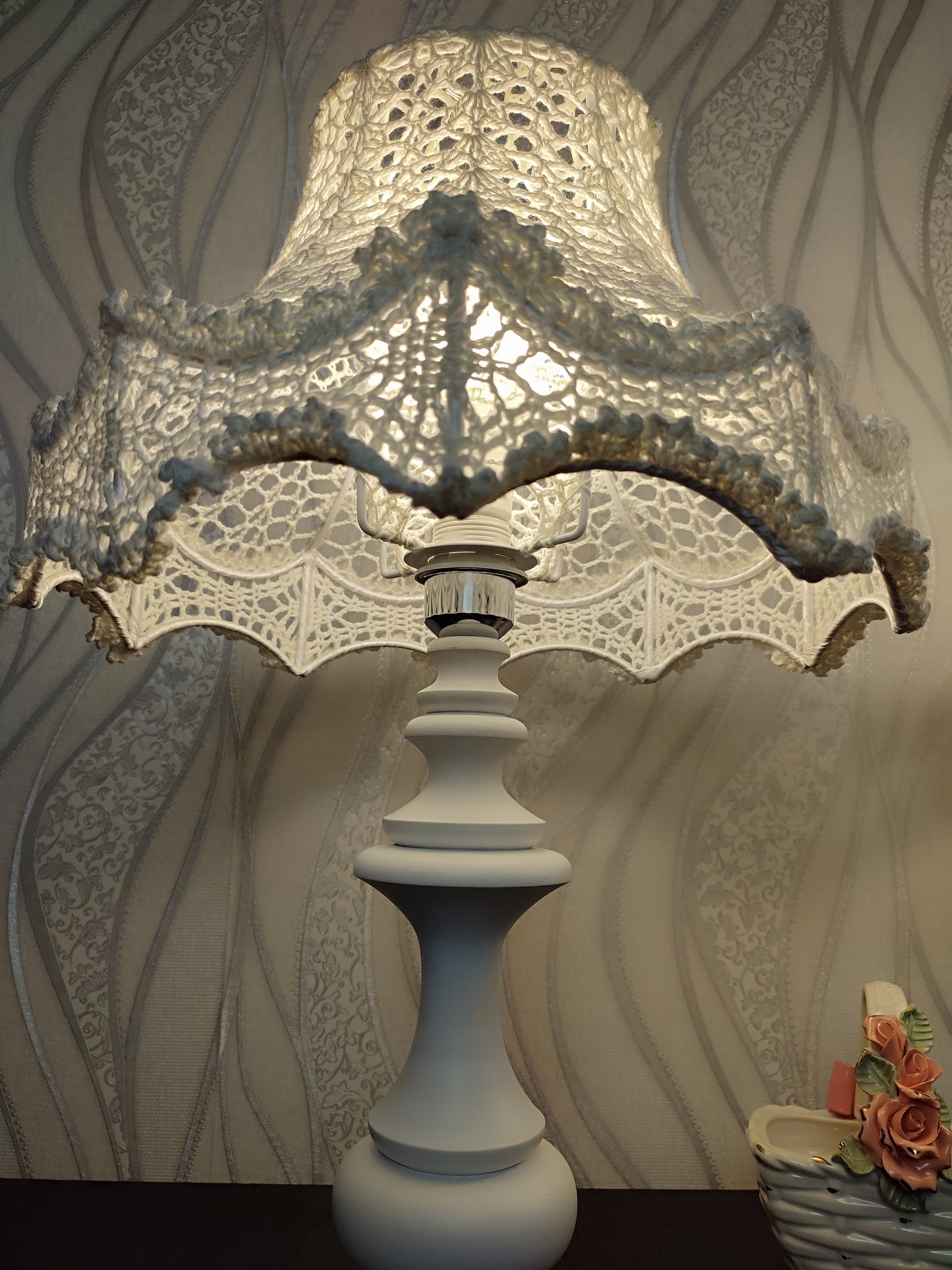 Table lamp, bedside. A chic table lamp in pastel white color with a delicate lace shade. 1301