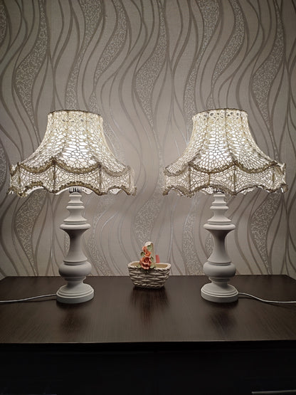 Table lamp, bedside. A chic table lamp in pastel white color with a delicate lace shade. 1301