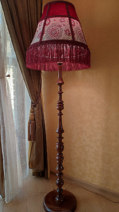 Floor lamp,  Elegant Vintage-Inspired Floor Lamp with Rich Ruby Shade, Delicate Floral Embroidery & Luxurious Fringe Details on a Sculpted Wooden Base. 3104