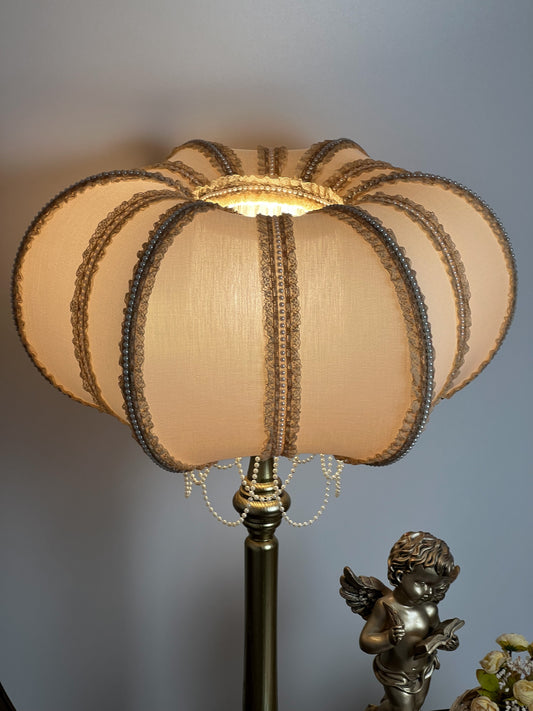 An unusually shaped, powder-colored lampshade with beads for floor lamps. № 2205