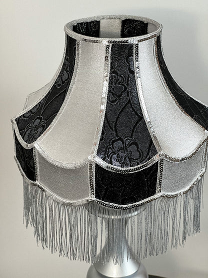 Luxurious Victorian table lamp with sequins and fringe.