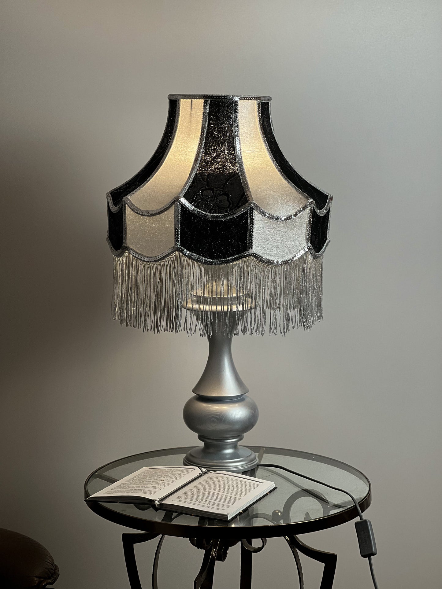 Luxurious Victorian table lamp with sequins and fringe.