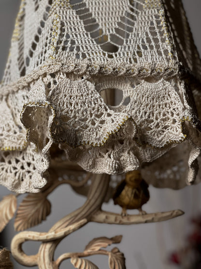 Victorian crochet table lamp with artistic wrought iron base