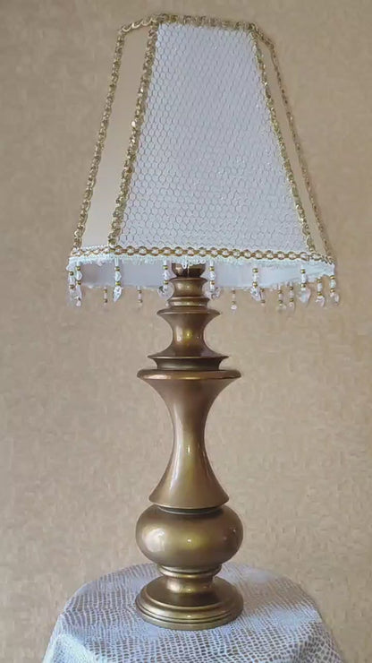 A beige and gold table lamp with beaded fringe, handmade. № 6401