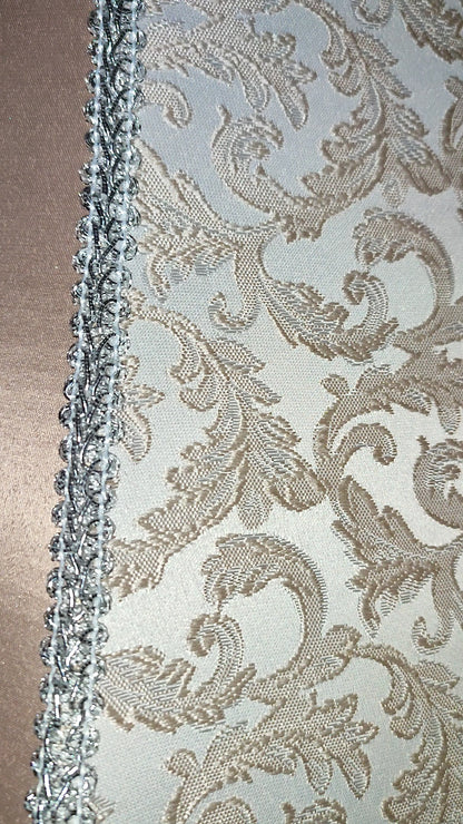 Handmade powder-colored lampshade with fringe. № 3703