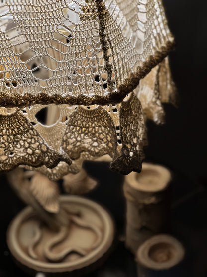 Victorian crochet table lamp with artistic wrought iron base