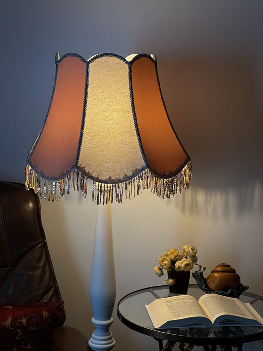 Handmade powder-colored lampshade with fringe. № 3703
