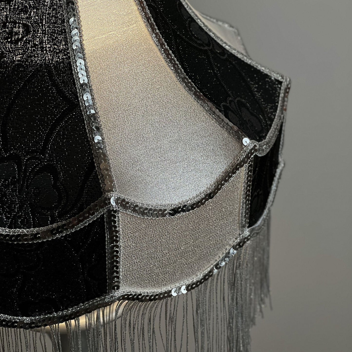 Luxurious Victorian table lamp with sequins and fringe.