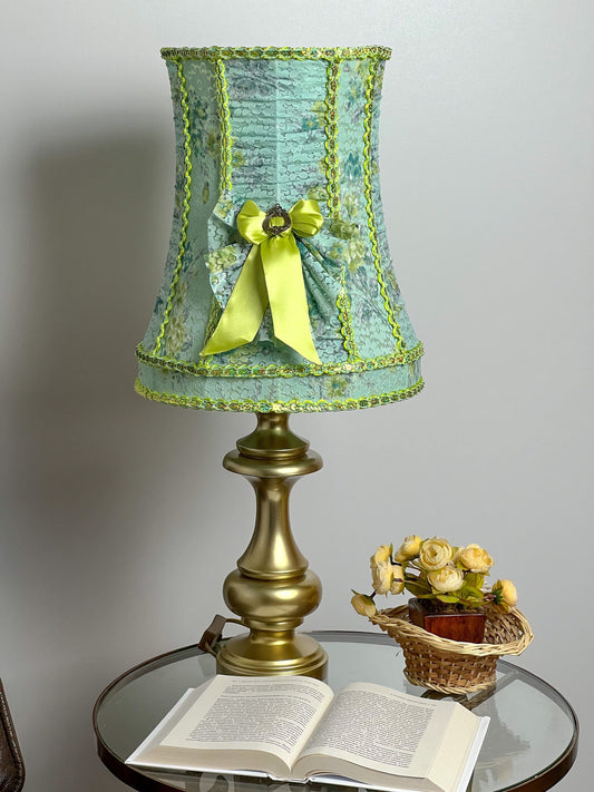 A unique lampshade. A fabulous light green lampshade with guipure and textiles for a table lamp. 0401