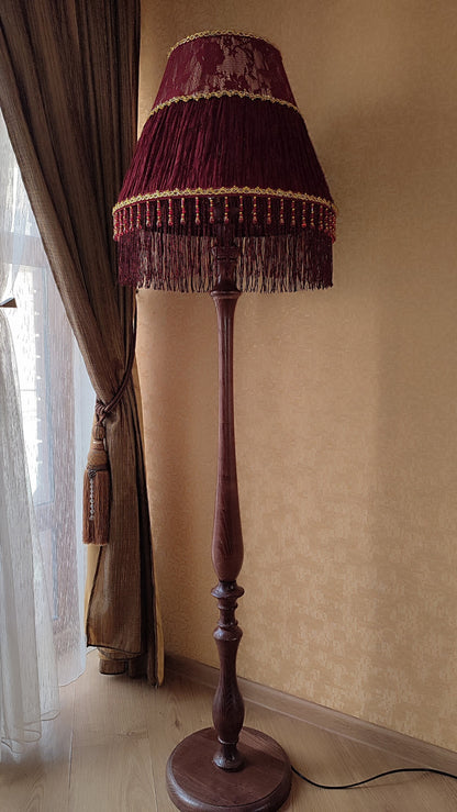 Floor lamp,  Elegant Vintage-Inspired Floor Lamp with Rich Ruby Shade, Delicate Floral Embroidery & Luxurious Fringe Details on a Sculpted Wooden Base. 3104