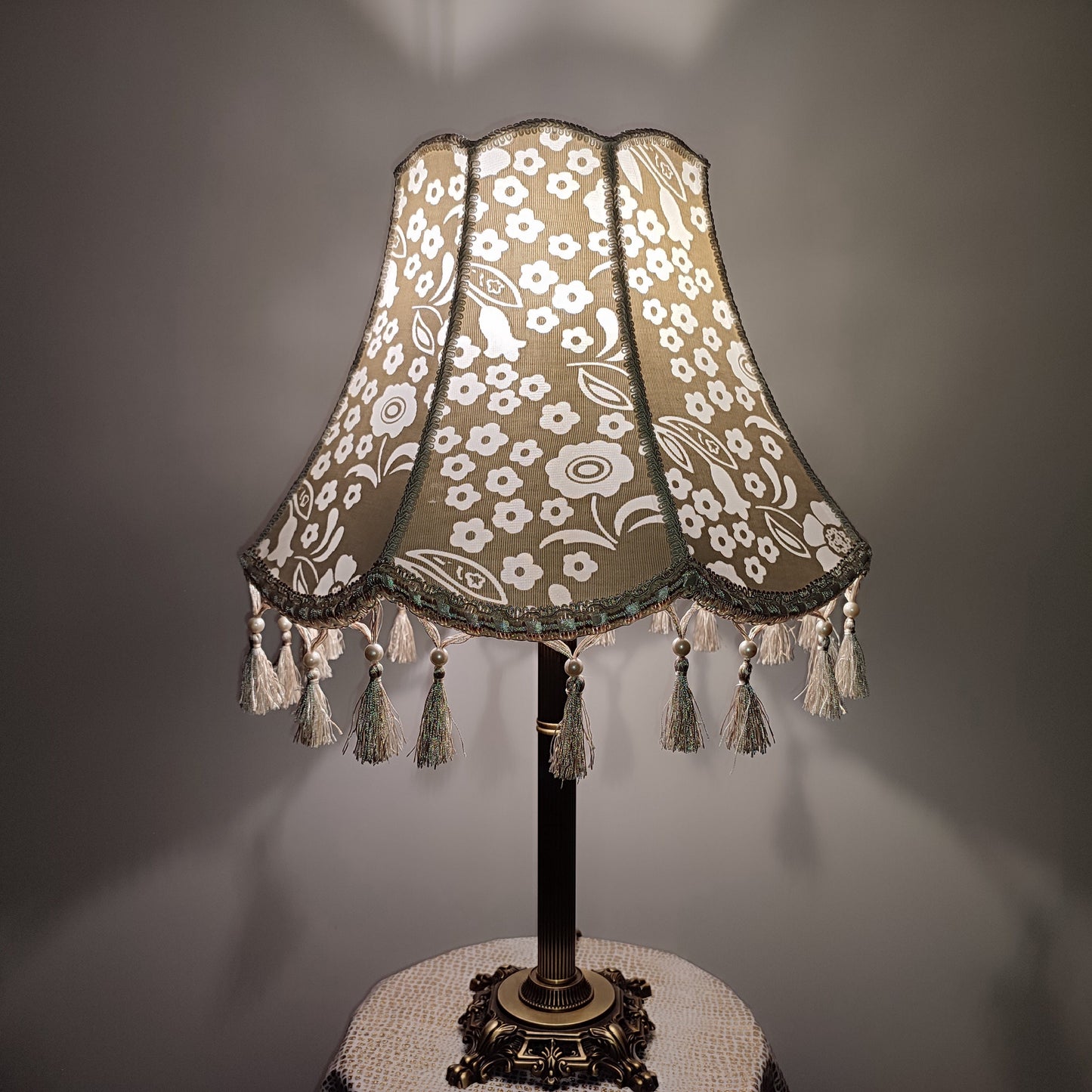 Vintage-inspired floral Lace Table Lamp with Tassel Detail and Antique Brass Base. 2002